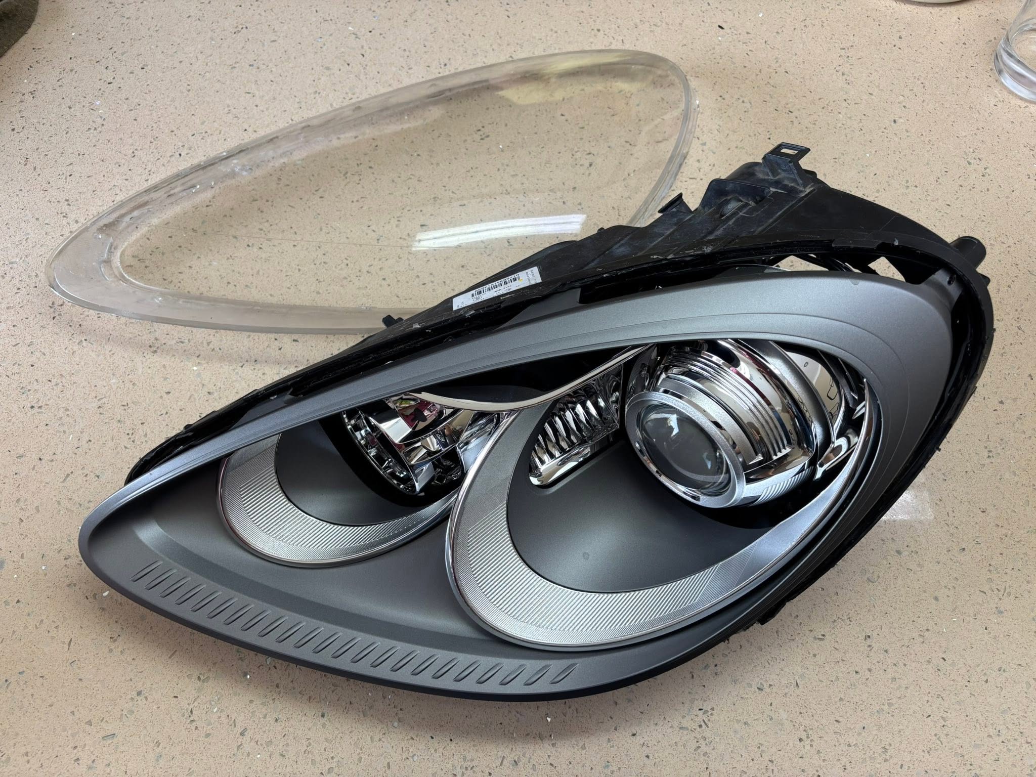 Porsche Cayenne 958 — Condensation Reseal — opened