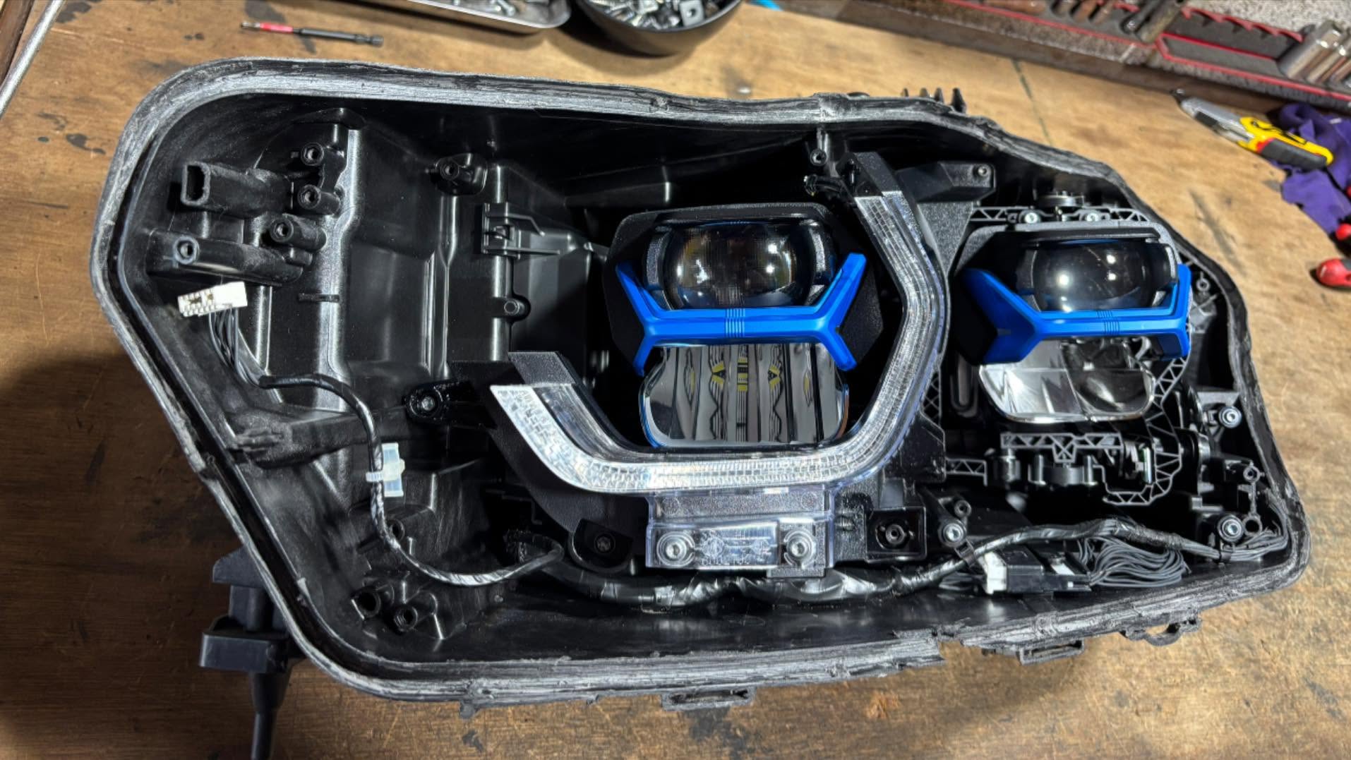 BMW X5 — Laser Headlight Reseal — opened