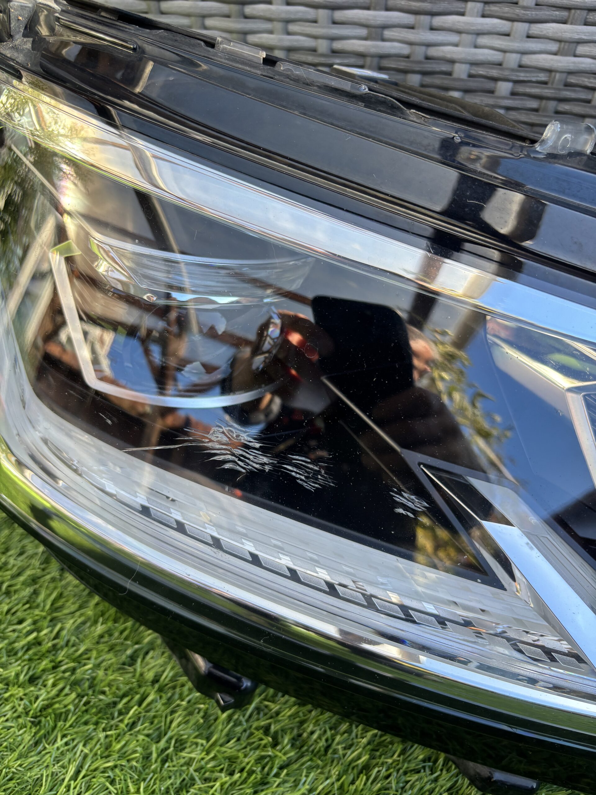 Volkswagen — Impact-Damaged Lens — before