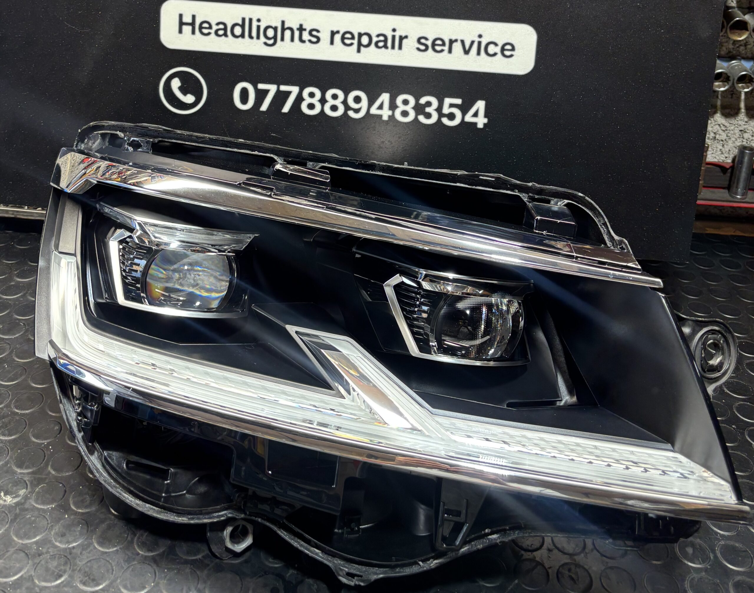 Volkswagen — Impact-Damaged Lens — rebuilt