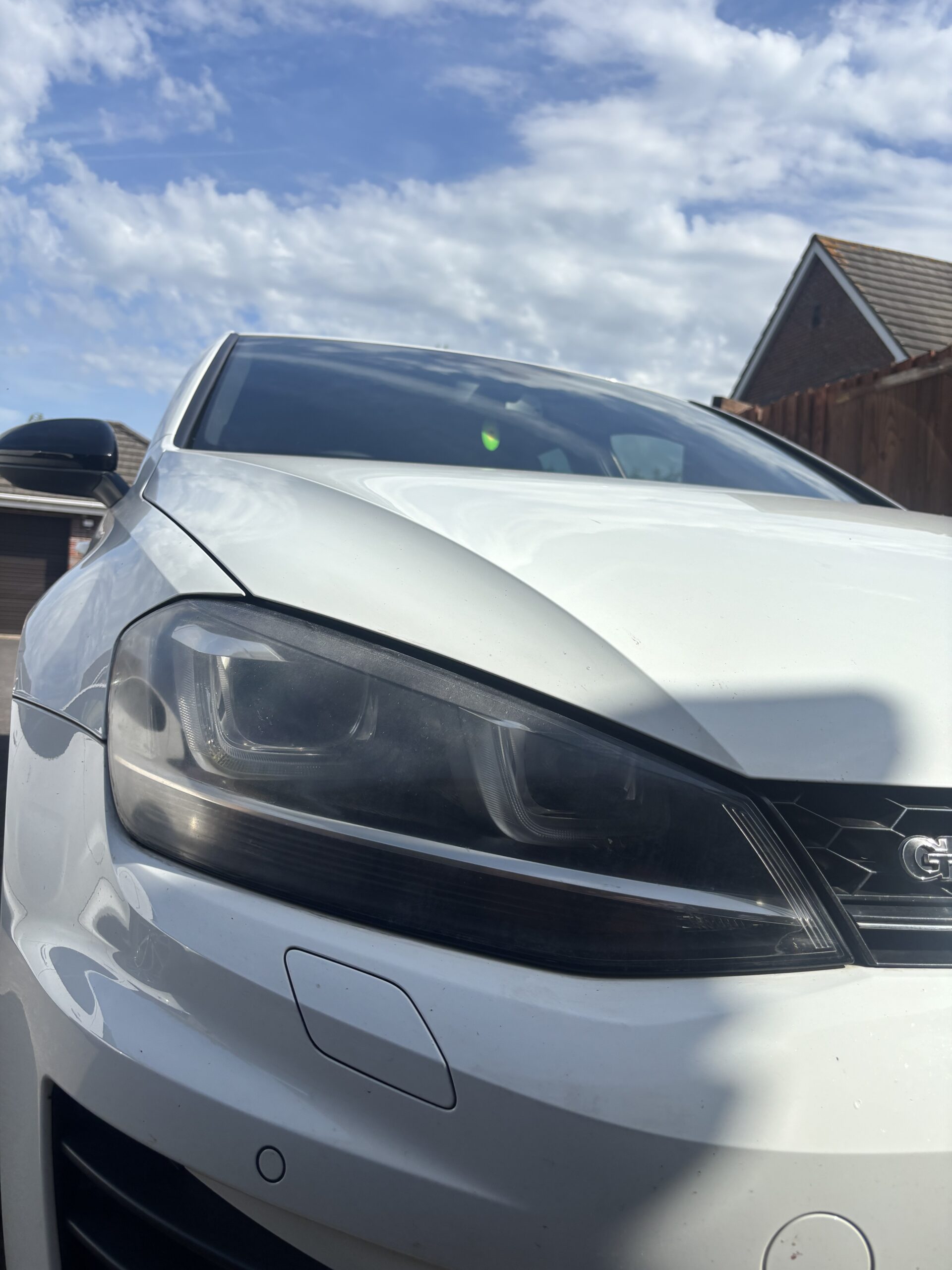 Volkswagen Golf — Both Headlight Lenses Replaced — before — left