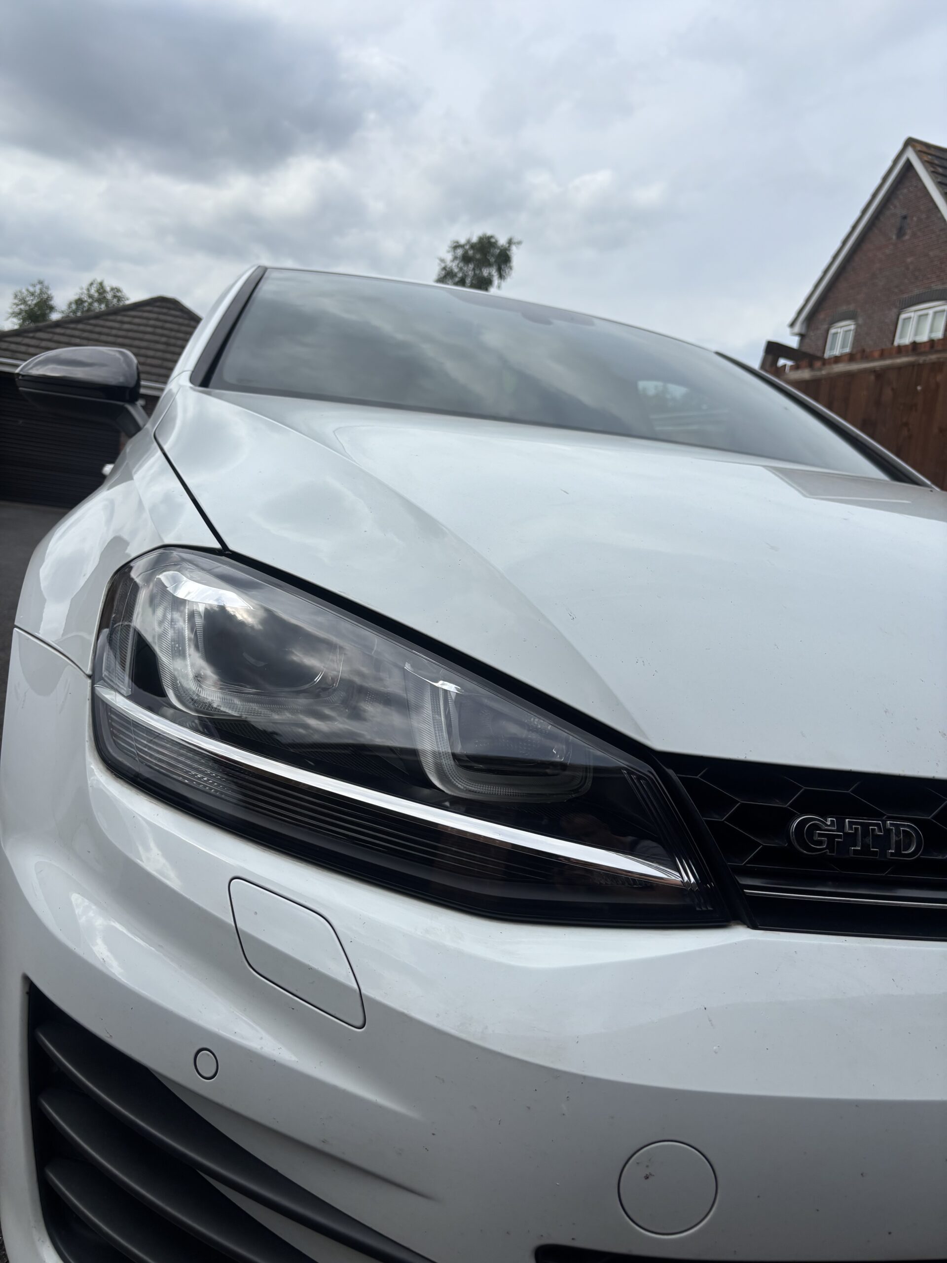 Volkswagen Golf — Both Headlight Lenses Replaced — after — left