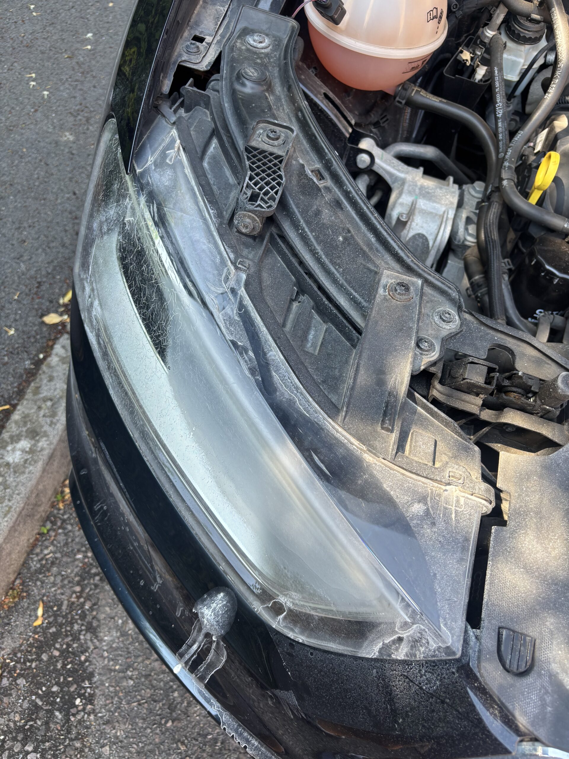 Audi Q3 — Lens Replacement After Failed Polishing — damage