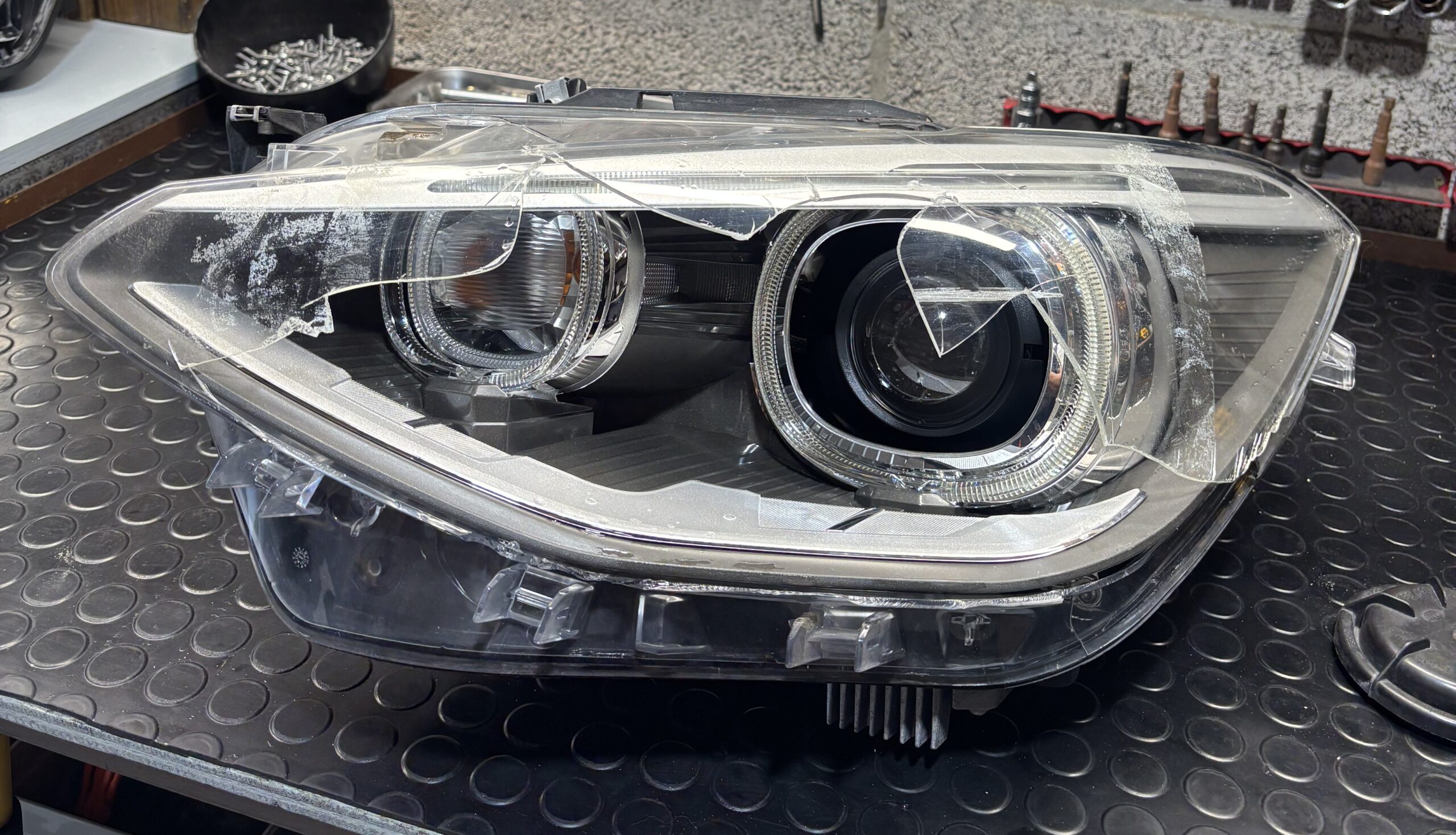 BMW 1 Series — Accident-Damaged Lens — damaged lens